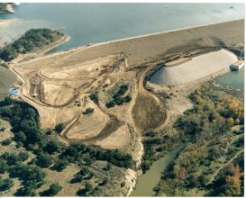 Overview of construction site of a dam and levee
