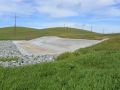 Grassy field with levee
