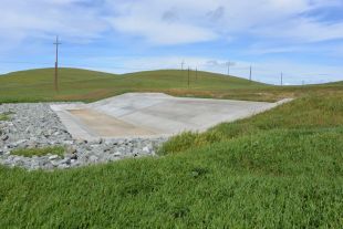 Grassy field with levee