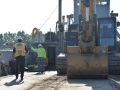 Construction workers overseeing worksite